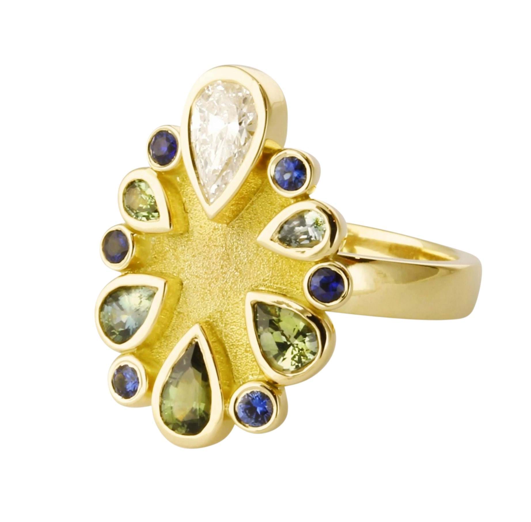 gold dress ring with coloured gems